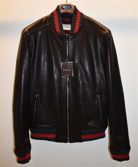 fake gucci bomber jacket|gucci bomber jacket women.